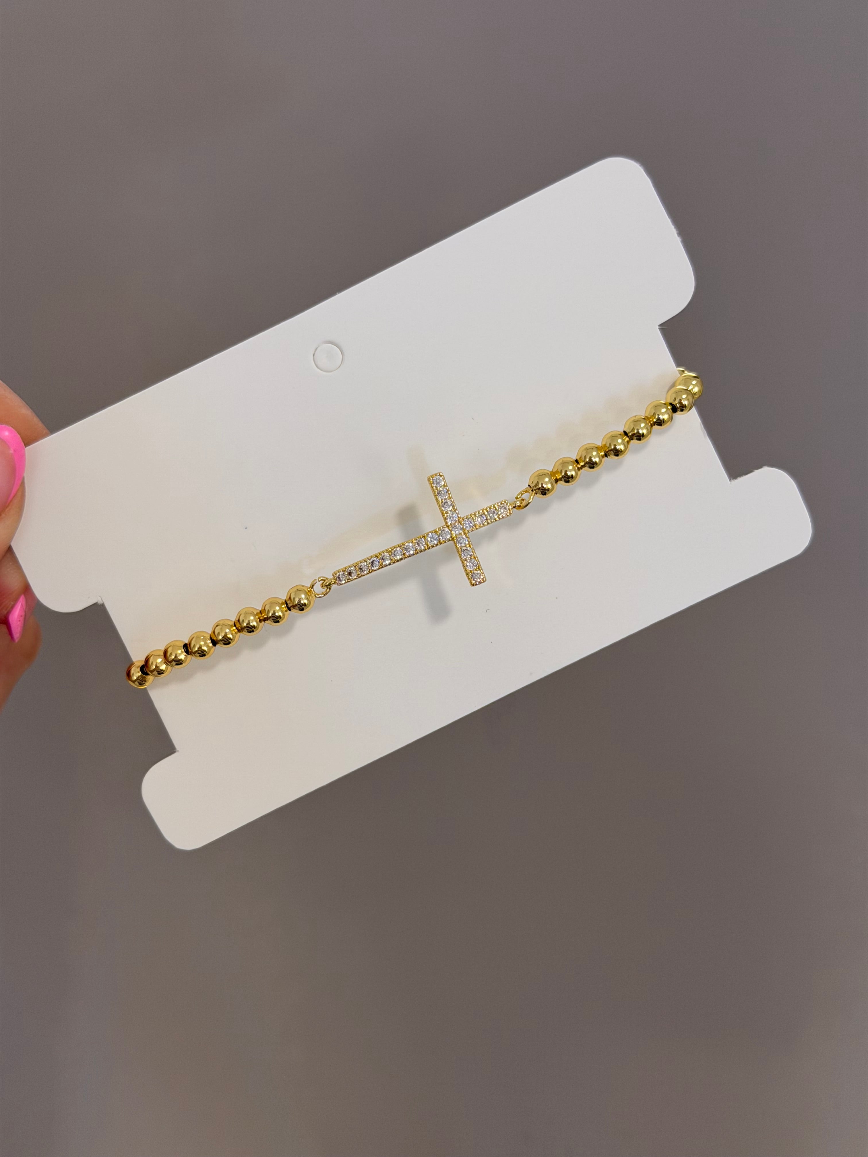 Pulsera cruz delgada larga